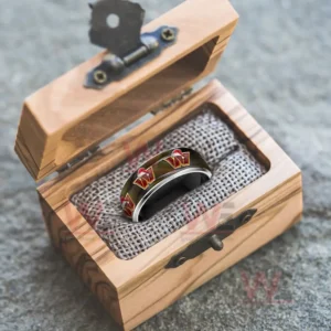 Silver ring with festive emblem band inside an open wooden gift box!