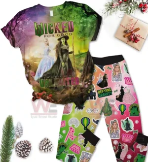 Wicked For Good Together We are Unlimited Pajamas set 5 A bright Wicked themed pajama set with a character shirt and patterned pants arranged on a white surface with seasonal decorations!