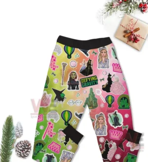 Wicked For Good Together We are Unlimited Pajamas set 6 Multicolored pajama pants decorated with various themed icons and characters displayed with holiday decor in the background!
