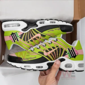 Alt text: A pair of Nike Air Max shoes in a box, showcasing vibrant green and pink design with custom text.