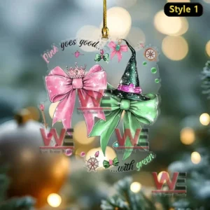 Alt text: Wicked ornament with pink and green bows and a holiday background.