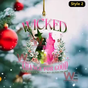 Alt text: Wicked ornament featuring character silhouettes with Change for Good text.
