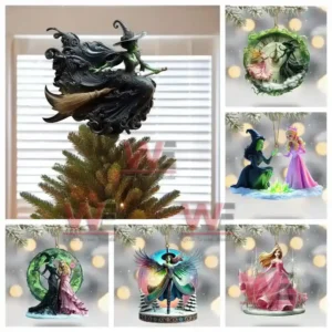 Tree topper of a green witch riding a broom placed on top of a Christmas tree.