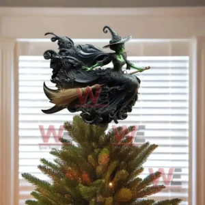 Clear ornaments showing magical witch themed winter scenes.