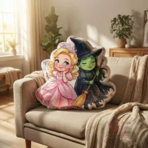 A plush pillow of a blonde princess and a green skinned witch sits on a beige sofa in a bright living room!