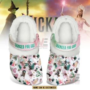 Top view of fleece lined clogs with a large bow graphic colorful themed illustrations and a pastel strap with green text!