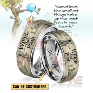 Two silver rings with beige Winnie the Pooh illustrated bands and customizable inner engraving!
