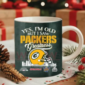 Football themed dark green mug with team helmet displayed on a table with Christmas decorations!
