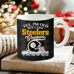 Dark football themed mug with team helmet and celebratory text placed among Christmas decor!
