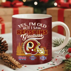 Red football themed mug with team helmet and championship graphics placed among Christmas decor!
