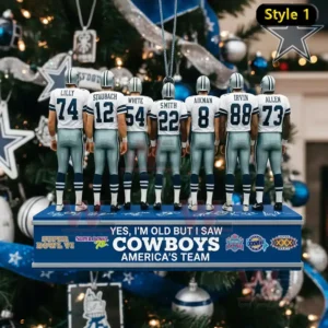 A detailed view of a Cowboys ornament on a Christmas tree showing multiple uniformed figures lined up on a blue platform surrounded by festive decorations!
