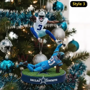 Yes Im Old but I saw Cowboys America's Team Ornament 7 A close view of an ornament showing an athletic leap by a Cowboys player above a diving defender hanging among tree decorations!