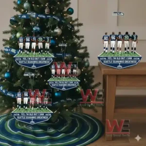 Yes Im Old but I saw Seattle Seahawks Greatness Ornament 4 Alt text: A close-up of a tree and table displaying multiple Seattle Seahawks figurines with team-themed ornaments.