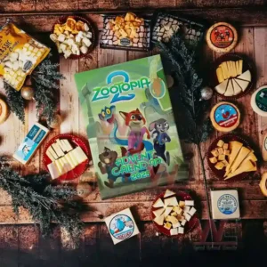 Zootopia Advent Calendar 5 Alt text: A Zootopia 2 Advent Calendar placed among holiday snacks, including cheese and crackers.