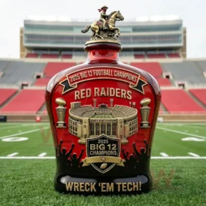 2025 Big 12 Championships Commemorative Edition Whiskey Bottle 6 A red championship bottle on a football field with stadium seats visible behind it!