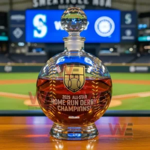Crystal whiskey decanter with amber liquid and championship engraving displayed on a table with a baseball stadium in the background!