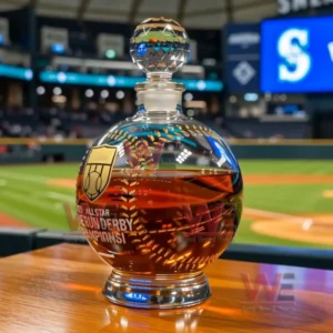 Close up of a crystal whiskey decanter showing engraved details and amber whiskey inside!