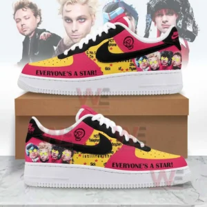Side view of two custom designed sneakers with bright colors graphic illustrations star motifs and bold text elements inspired by contemporary music style!