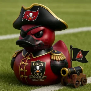 Red pirate rubber duck wearing a captain uniform with flag and cannon displayed on a football field background!