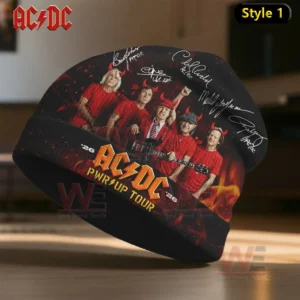 Image shows a black AC DC tour beanie with the band standing together in red clothing fiery background effects and bold tour logo!