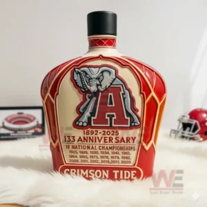 Red football themed bottle with elephant emblem and black cap displayed on a white fur surface!