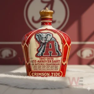 Red commemorative bottle with elephant logo and gold crown cap in a classic sports setting!