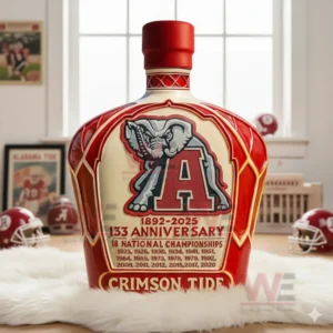 Red football heritage bottle with elephant emblem and red cap displayed indoors!