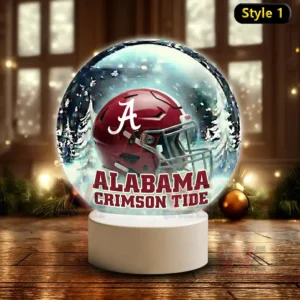 Snowy themed decorative globe featuring Alabama Crimson Tide helmet glowing on a white base!