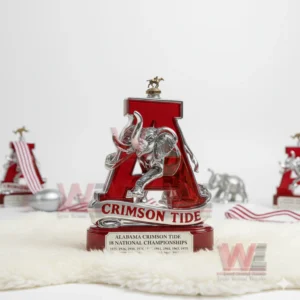 Alabama Crimson Tide National Champs Whiskey Decanter 9 Crimson tide decanter with silver elephant among similar decorations on a white background.