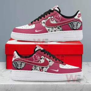 Side profile of Alabama Crimson Tide themed athletic shoes on a neutral background!