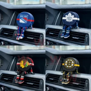 A round hockey logo figure with small legs is displayed on a car dashboard air vent adding a sporty decorative touch!