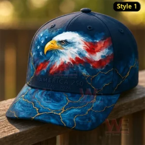 Dark blue baseball cap with a painted bald eagle and American flag pattern plus America 250 and 1776 2026 text on the front.