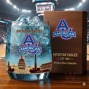 American Eagles whiskey glass with ice and a wooden branded box displayed on a table inside a sports arena environment!