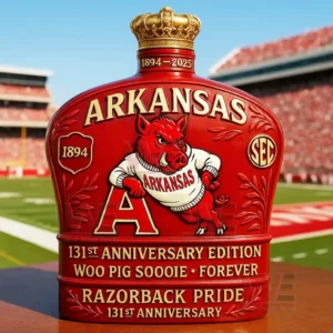 Arkansas 131st Anniversary Crown Royal Bottle 5 A red Arkansas bottle with bold lettering is displayed prominently with a football field behind it!