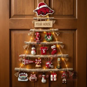 Arkansas Razorbacks Premium Rustic Wall Christmas Tree Ornament 3 A rustic wooden branch Christmas wall tree decorated with Arkansas Razorbacks ornaments and warm lights hanging on a wooden door!