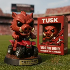 Razorbacks hog mascot figure riding a four wheel vehicle on a football field with a red themed box in the background!