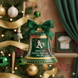 A green and gold Athletics bell ornament hanging on a Christmas tree with festive decorations!