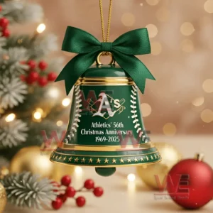 A close up of a green Athletics themed holiday bell ornament with gold detailing and a green bow!