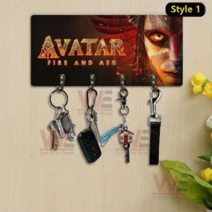 Style one Avatar Fire And Ash wall key holder with fiery title text glowing eye portrait and four hooks holding keys on a light wood wall!