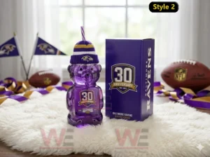 Baltimore Ravens 30th Anniversary 1996-2026 Bear Glass Cup 4 Bear shaped glass cup with Baltimore Ravens anniversary theme displayed among football decorations!