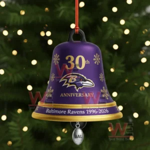 A close up of a purple Baltimore Ravens anniversary bell ornament with gold and snowflake details!
