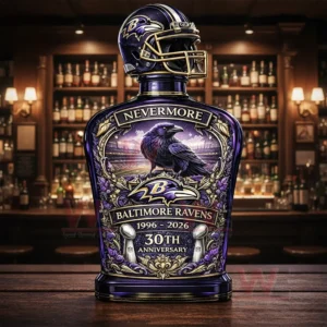Ravens themed decorative whiskey bottle with football helmet top displayed on a bar counter with shelves of spirits in the background!