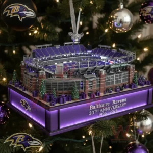 Baltimore Ravens stadium anniversary ornament displayed on a decorated Christmas tree with purple and silver holiday decor!