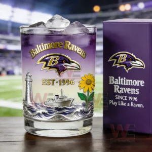 Baltimore Ravens themed whiskey glass with purple drink ice and detailed maritime and floral design next to a team branded box!