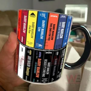 Close view of a ceramic mug featuring retro cassette album artwork wrapped around the surface!