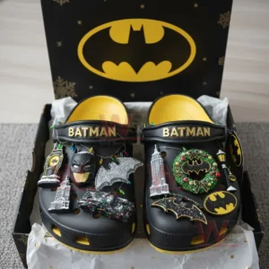 Batman themed clogs in a box with yellow interior and detailed decorative charms!