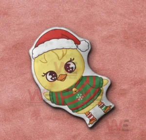 BbokAri Stray Kids Custom Shaped Pillow 5 Christmas chicken character pillow laid on a pink fabric background!