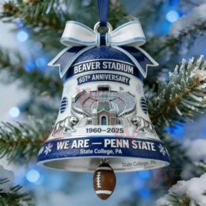 Beaver Stadium anniversary bell ornament hanging on a snow covered Christmas tree with blue lights and a football charm!