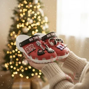 Big Time Rush Christmas Crocs Clogs with Charms 5 Red music themed clogs held by a person in front of a bright Christmas tree!