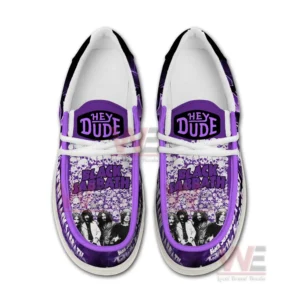Top view of purple slip on shoes with heavy metal inspired graphics and band visuals!